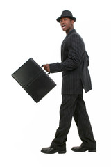 attractive business man in pin striped suit & hat