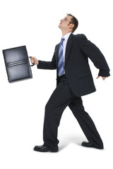 business man walking with briefcase