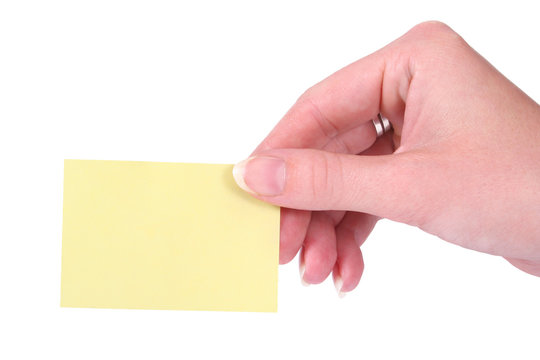 Hands Holding A Yellow Blank Notecard