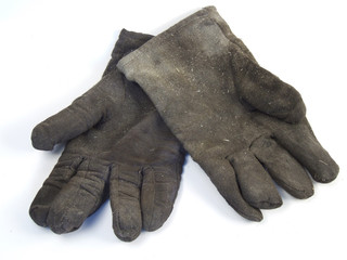 dirty and used work gloves