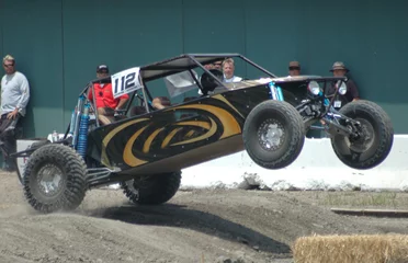Photo sur Aluminium Sport automobile sand car in air