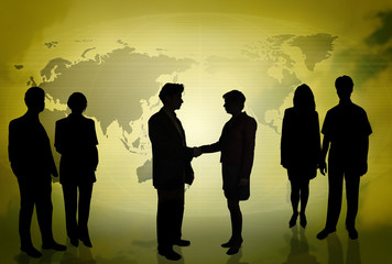 business people in front of a world map gold
