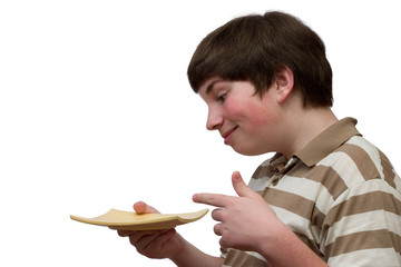 smiling boy pointing at something