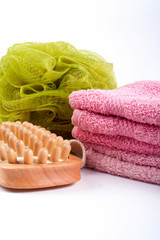Fototapeta na wymiar towels, body sponge and wood brush