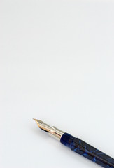 fountain pen and paper