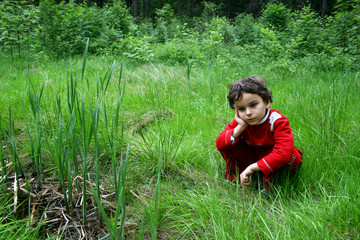 the boy in a forest.