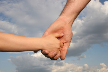 father's and son's hands