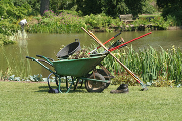 gardening tools by pond
