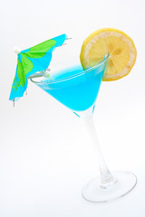 blue cocktail with lemon and unbrella