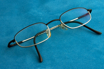 glasses on blue