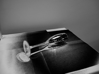 black and white glass lying down