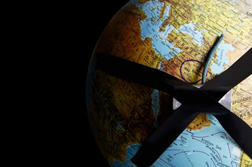 World war tragedy globe against black background