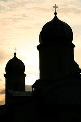 Fototapeta na wymiar church in sunset portrait