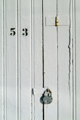 detail of wooden door with padlock