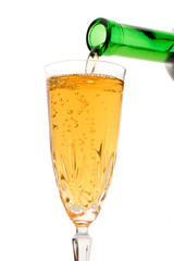 white wine pouring down from a wine bottle