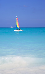 couple sailing turquoise waters