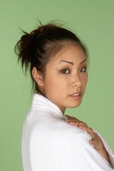 beautiful asian woman in white bath robe