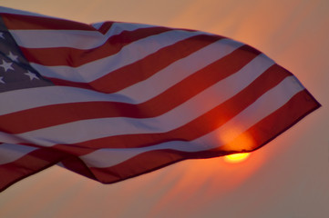 american flag at sunset