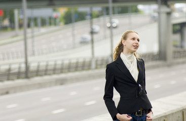 business woman near the road