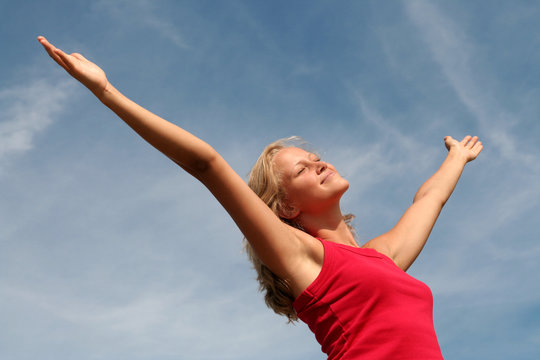 Happy Woman With Her Arms Wide Open