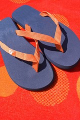 orange and blue flip flops