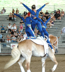 horse vaulter team performing