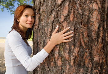 girl on a beach in a shadow of a tree-1