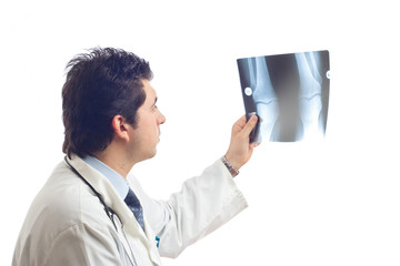 doctor examining x-ray scans