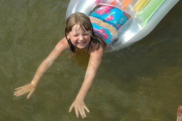 little girl floating