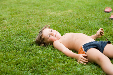 lying on the grass