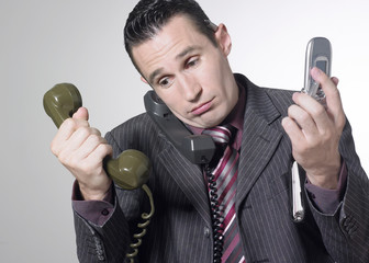 homme d'affaires et téléphones