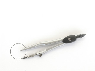 a pair of compasses and a circle