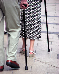 seniors with walking sticks