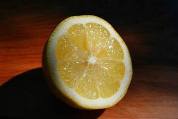 lemon on cutting board