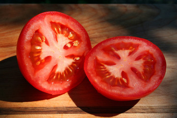 tomatoes on cutting board