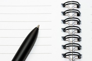 empty blank ring, spiral notepad, one pen