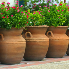 three coiled clay pots 2
