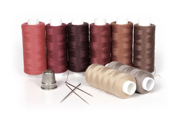 thread, thimble and needles