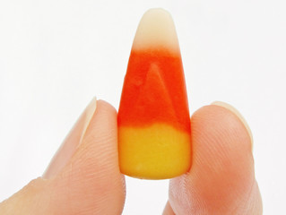 halloween candy corn holding