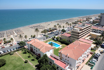 aerial view of beach and holidaymakers on vacation