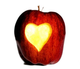 apple with heart carved in