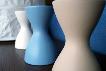 three colored vases