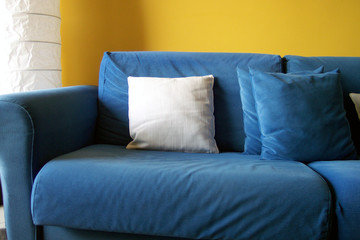 blue couch and pillows