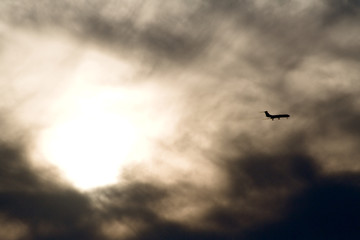 air liner in evening sky, sunset