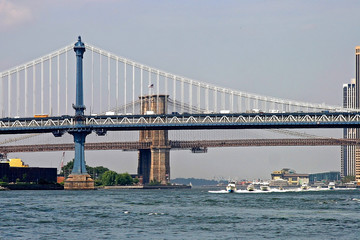 boats under bridge