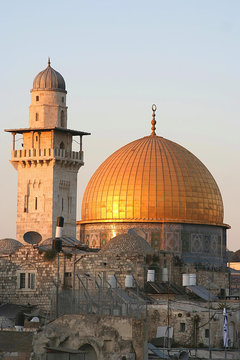 the dome of the rock at sunset