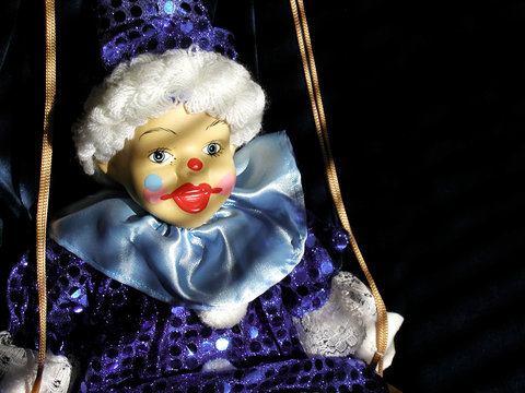 clown doll on swing
