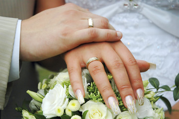 hands with wedding rings