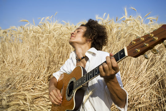 playing guitar - Powered by Adobe