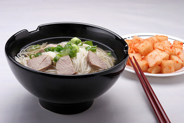 korean noodles and radish kimchi.